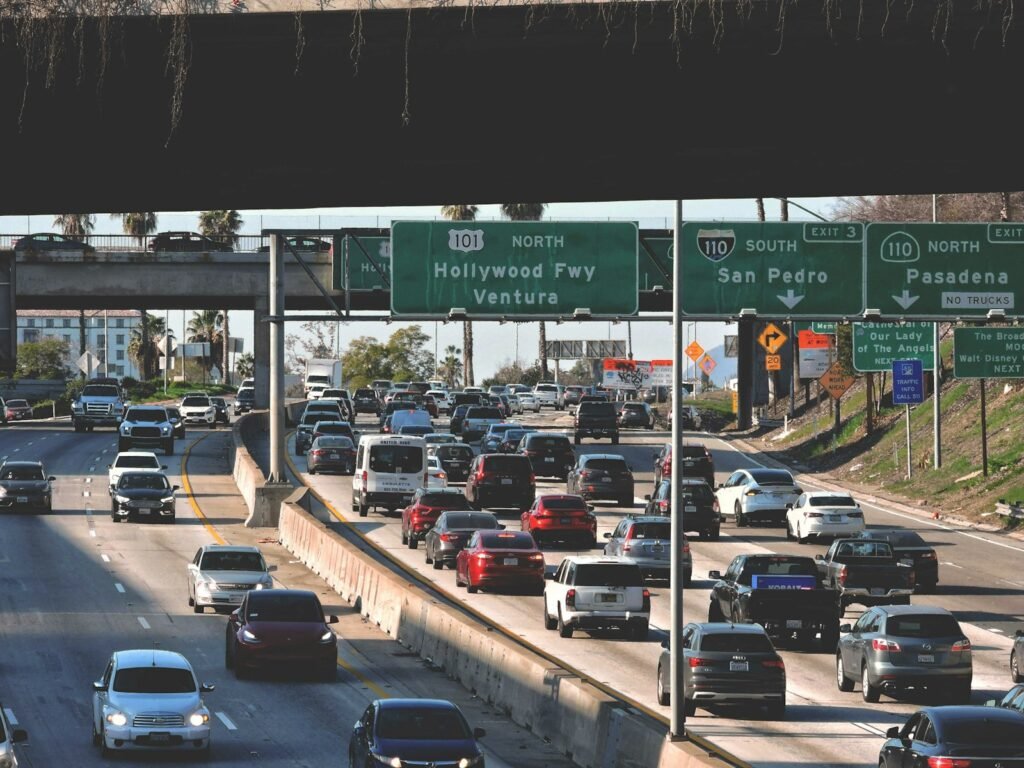 Busy highway traffic under a bridge