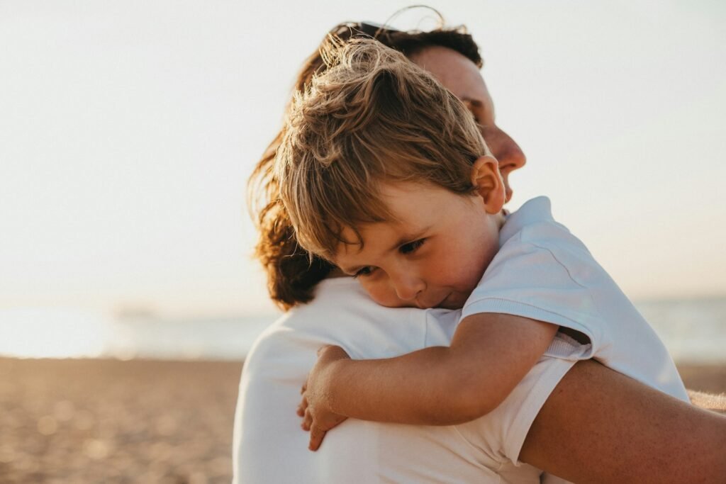 Boy hugging his mother